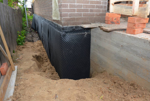 SJ Waterproofing Pros technician performing targeted Vapor Barrier Installation assessment in Perry, NY